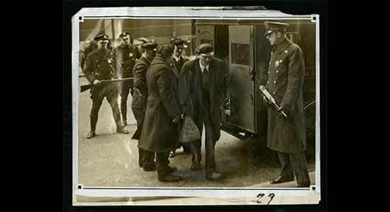 Bankers moving $50,000 ($1,027,000 in 2024) to the new bank building, 1931